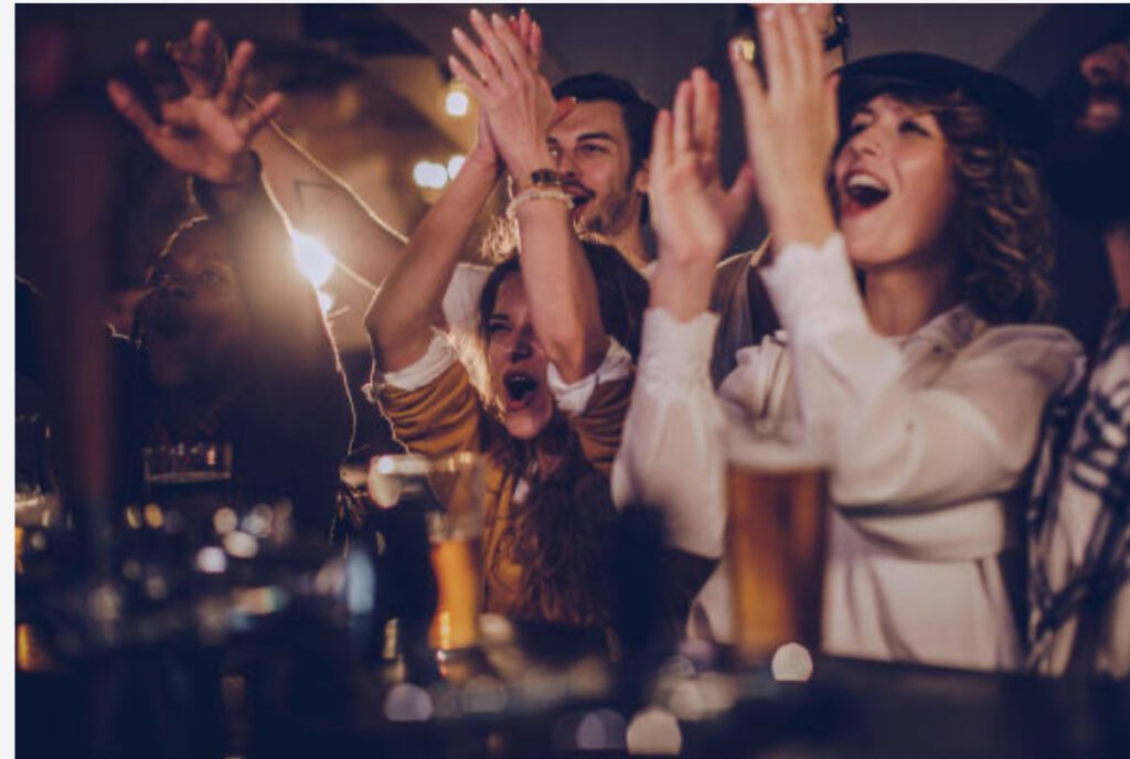 Crowd cheering at mobile bartending services in League City event